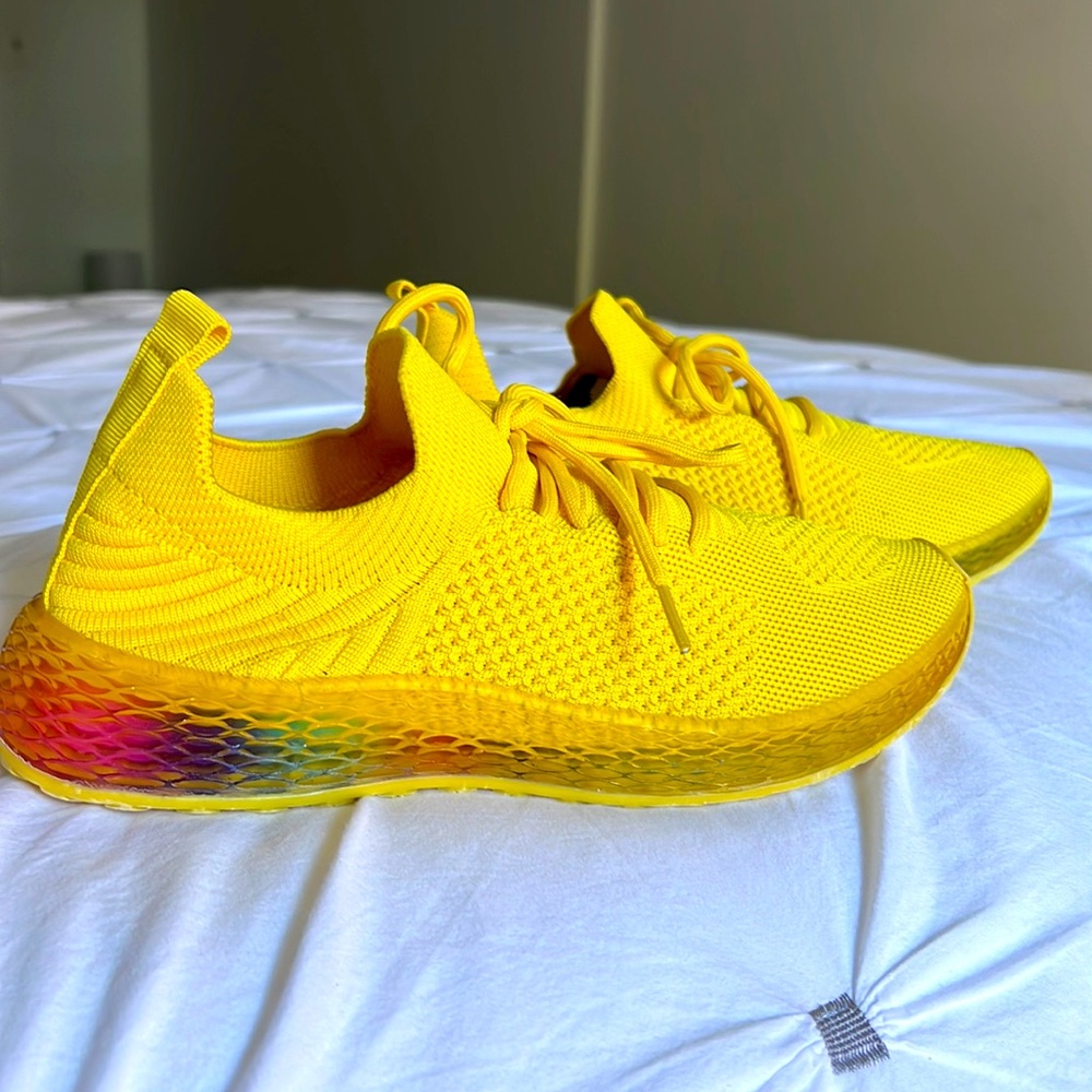 Yellow sneakers size 7.5. Can be mistaken for brand new.